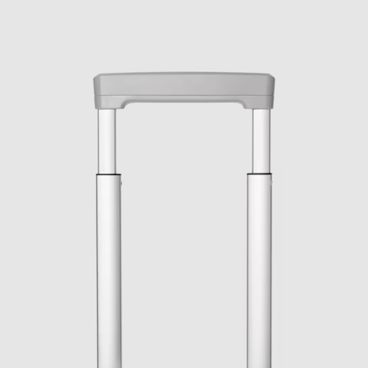 Detail of the stage-free telescopic handle extended from the suitcase